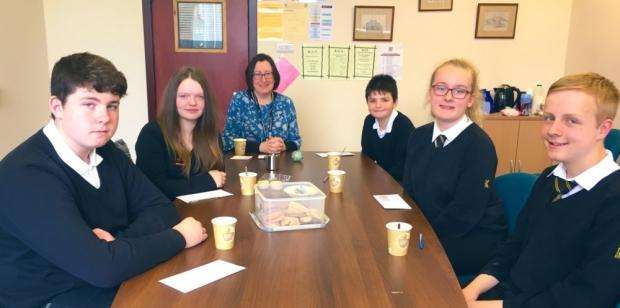 Students drinking hot chocolate at school