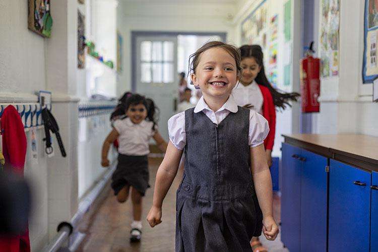 COSD child running down corridor