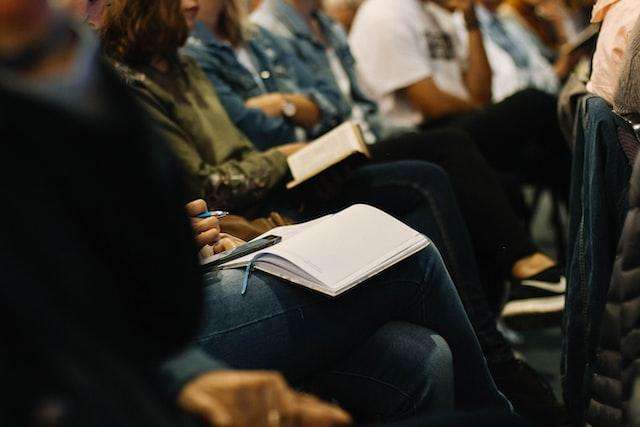 photograph of people at a meeting